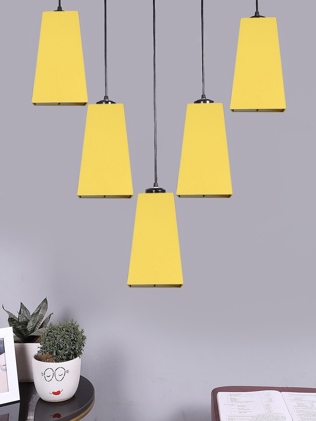 

Devansh Yellow Cotton Pyramid Quintuple Hanging Lamps