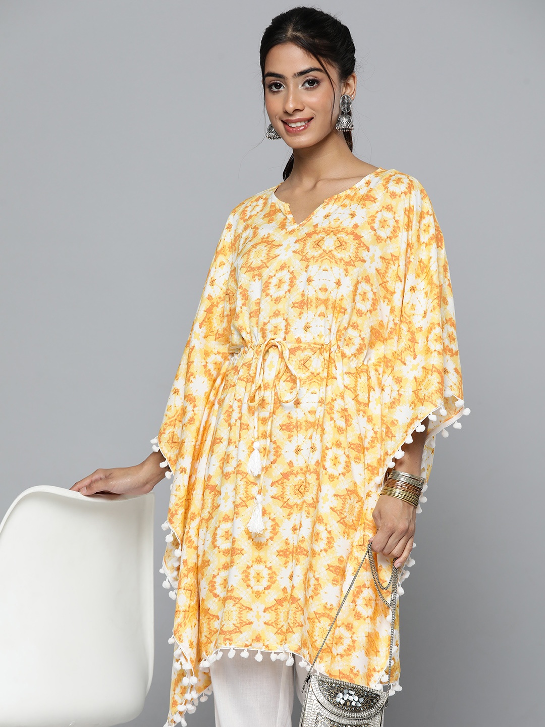 

HERE&NOW Abstract Printed Flared Sleeves Kaftan Kurti with Tie-Ups Detail, Yellow
