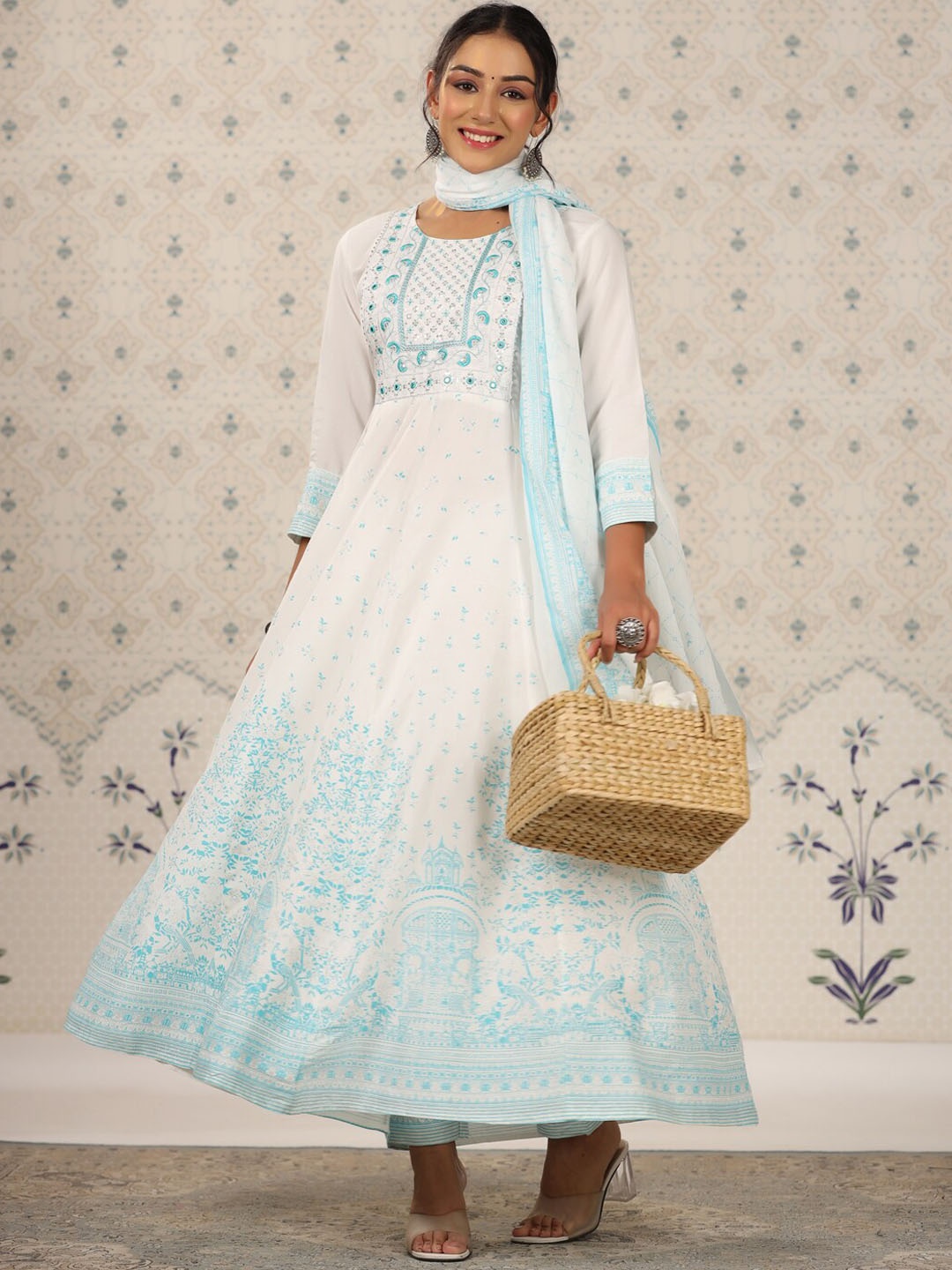 

Ode by House of Pataudi Turquoise Blue Floral Printed Kurta with Trousers & Dupatta
