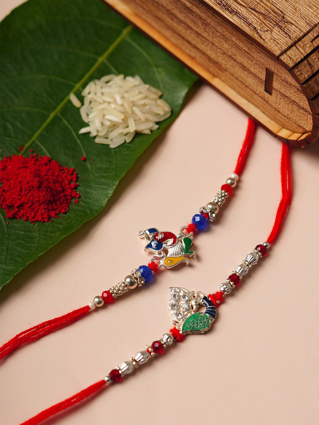 

Urmika Set of 2 Shri Ganesh Rakhis, Red