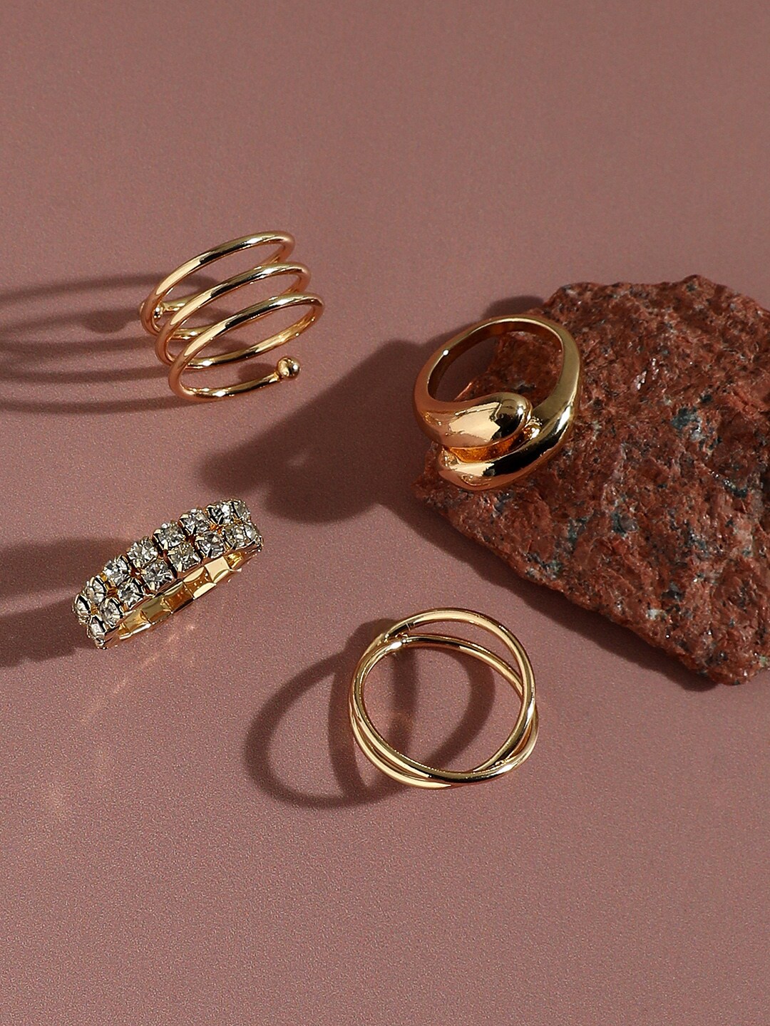 

SOHI Set Of 4 Gold-Plated Artificial Stone Studded Finger Ring