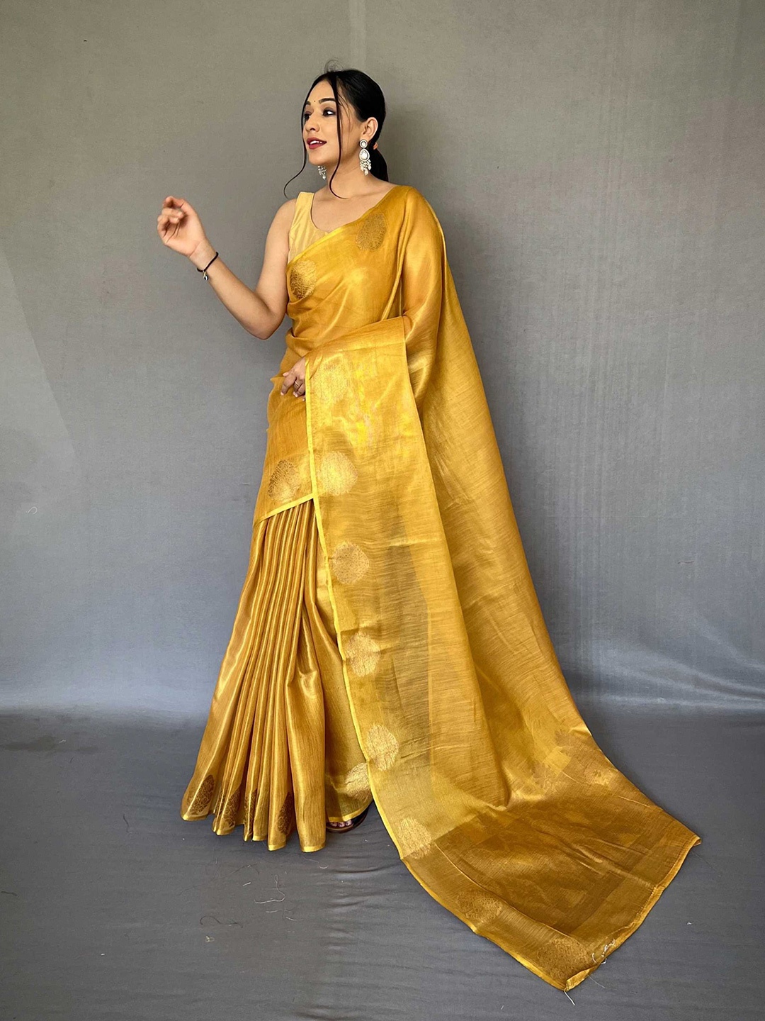 

Mitera Yellow & Gold-Toned Woven Design Zari Tissue Saree