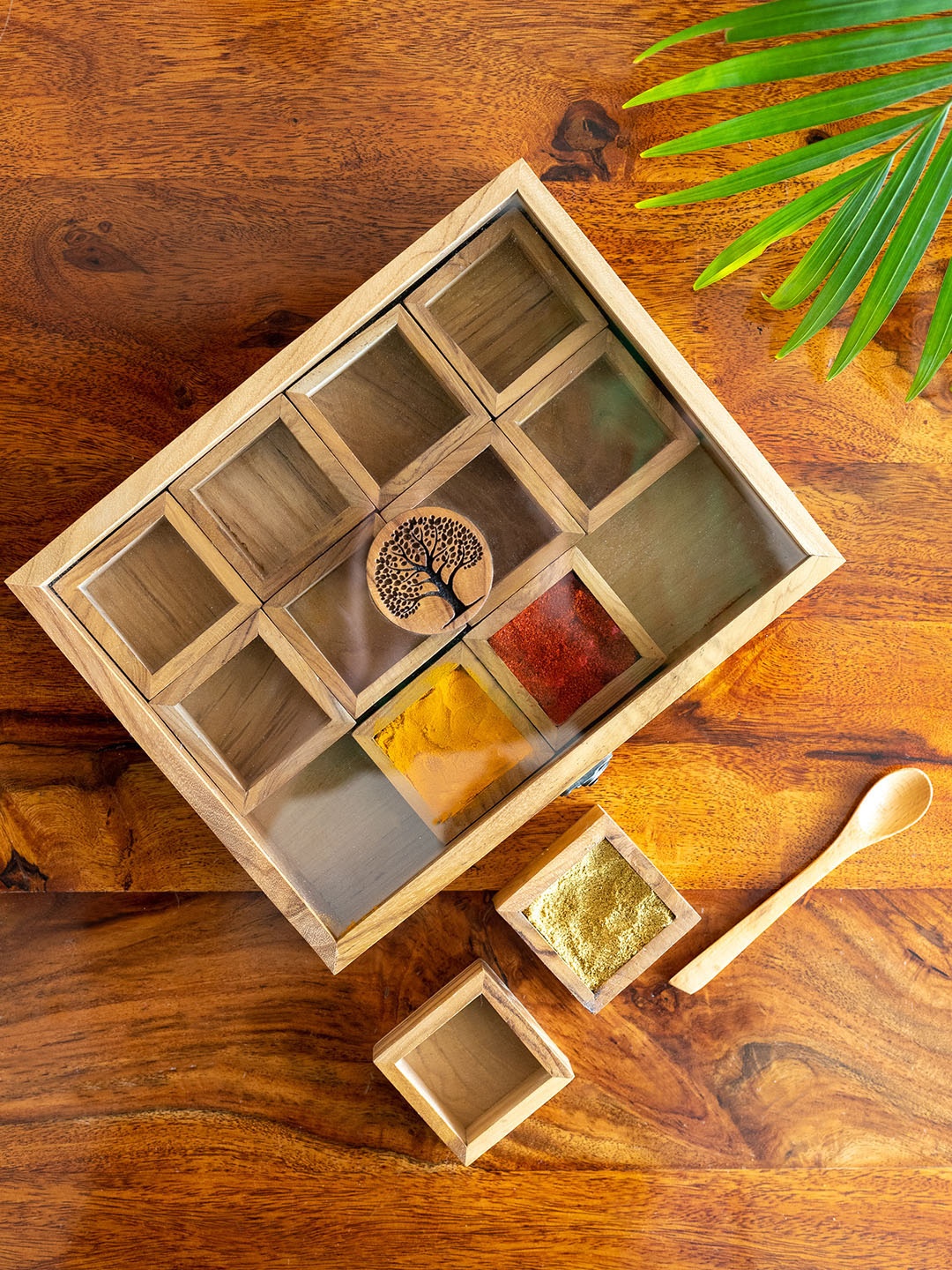 

ExclusiveLane Tree Of Life Brown Teak Wooden Spice Box With 12 Containers & Spoon