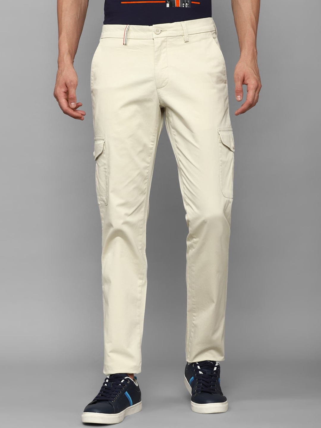 

Louis Philippe Sport Men Mid Rise Slim Fit Cotton Trousers, Cream