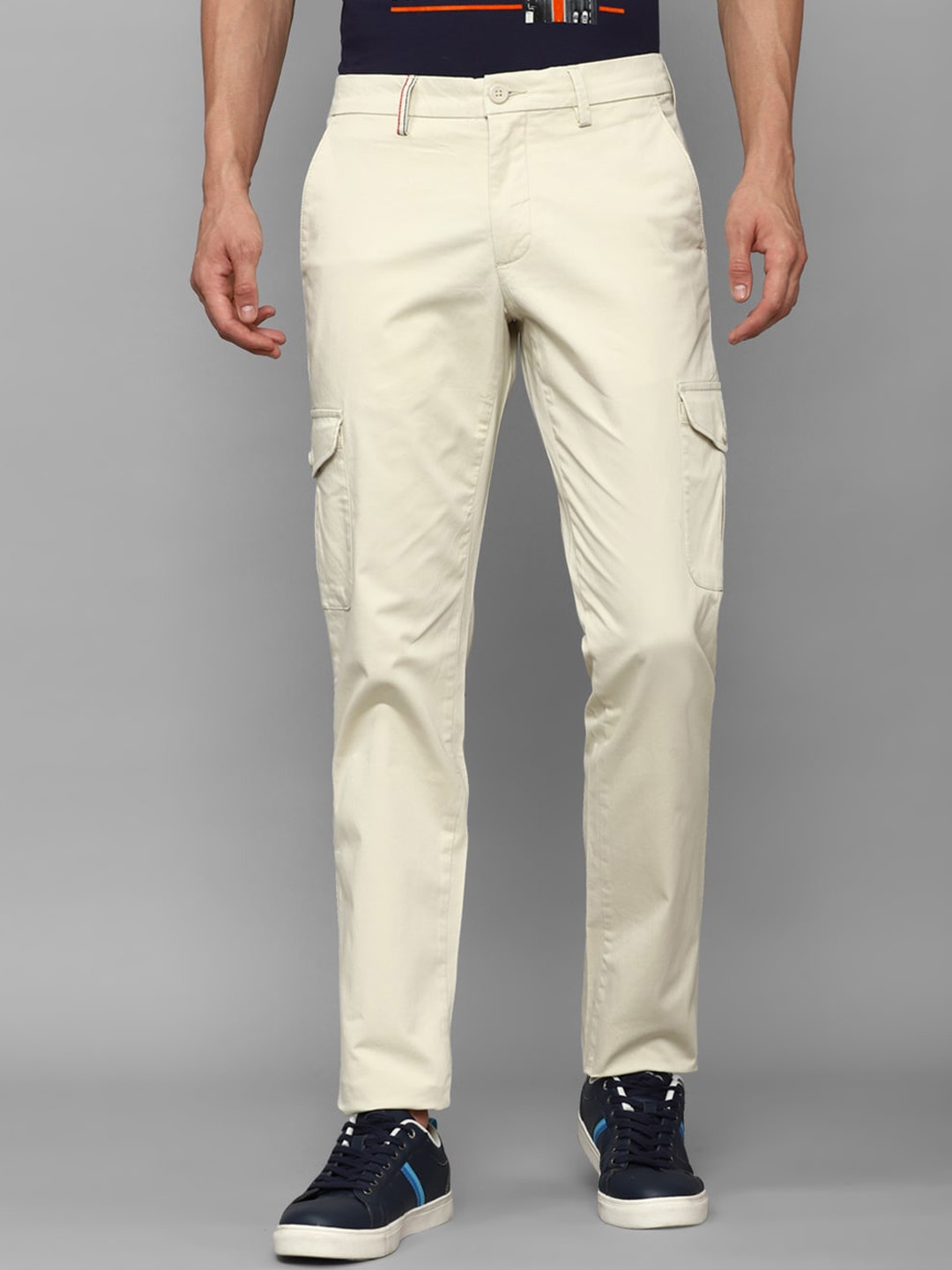 

Louis Philippe Sport Men Mid Rise Slim Fit Cotton Trousers, Cream
