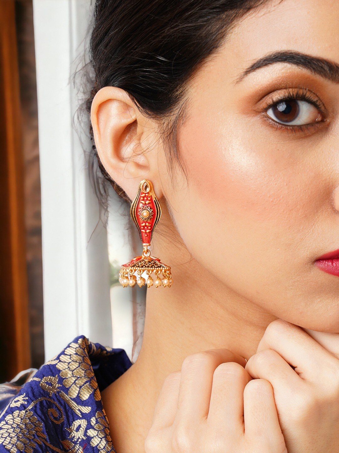 

Anouk Gold-Plated Teardrop Shaped Jhumkas