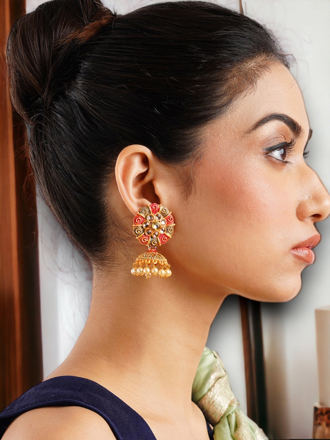 

Anouk Gold-Plated Red Dome Shaped Jhumkas Earrings