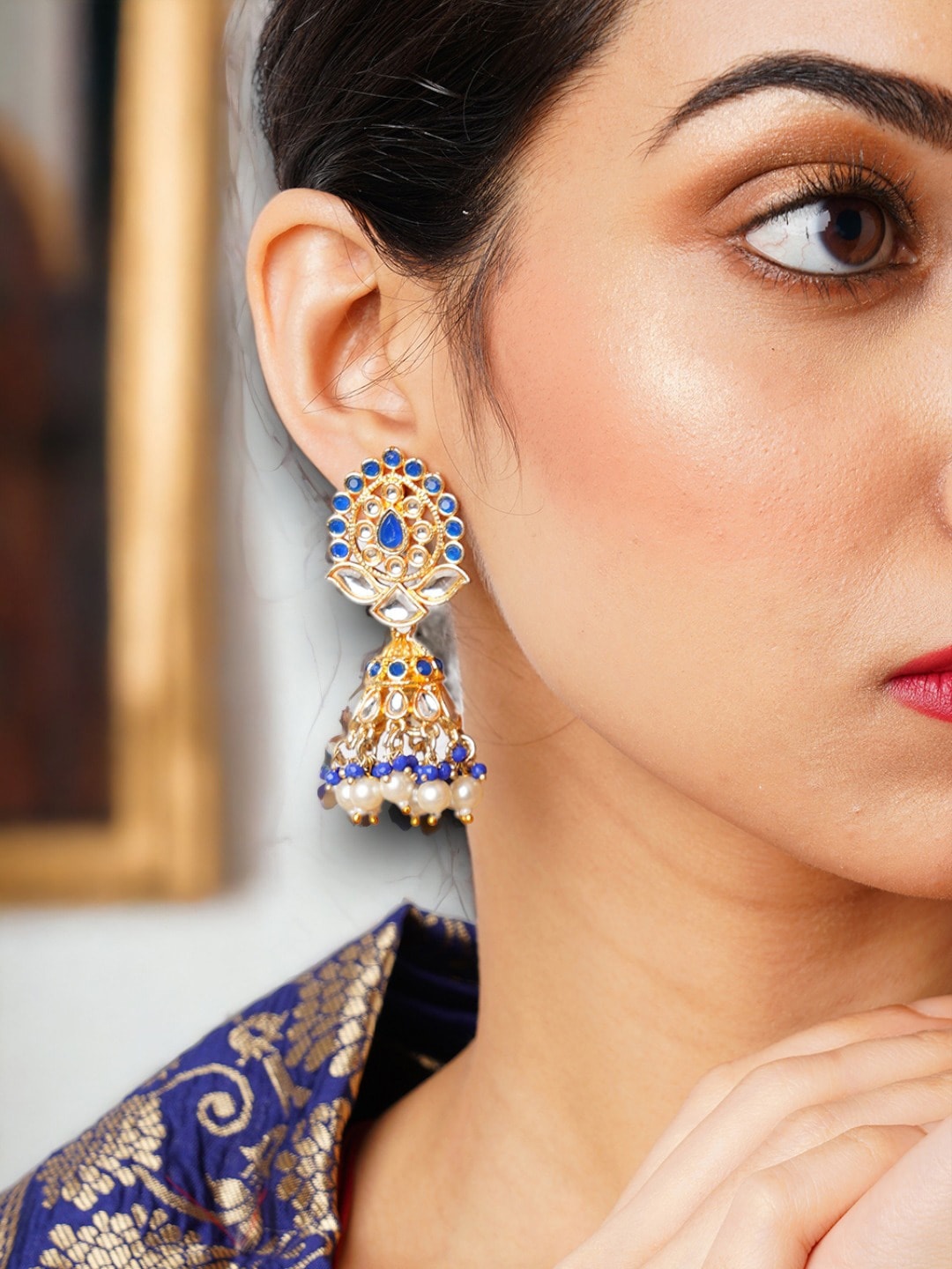 

Anouk Gold-Plated Blue Dome Shaped Jhumkas Earrings