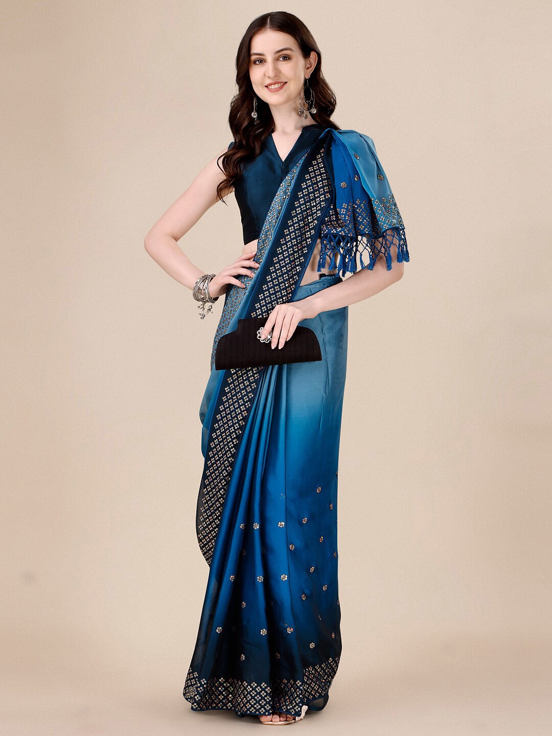 

Mitera Teal Sequin Embellished Saree