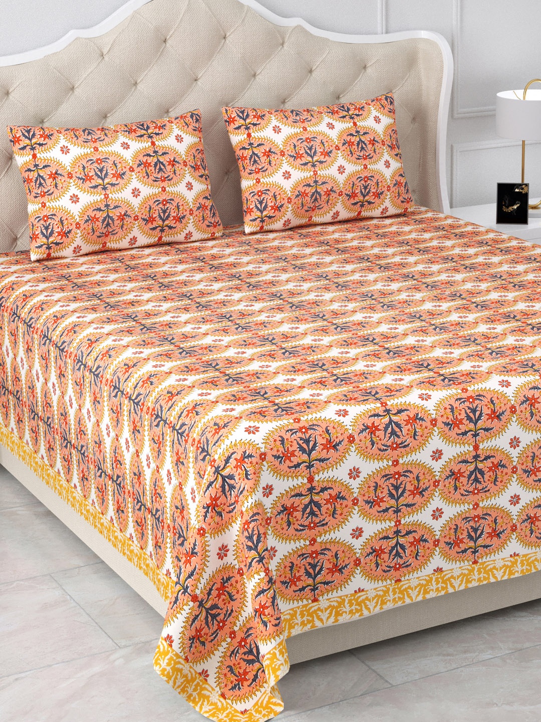 

Aapno Rajasthan Peach-Coloured Printed 120 TC Cotton King Bedsheet & 2 Pillow Covers