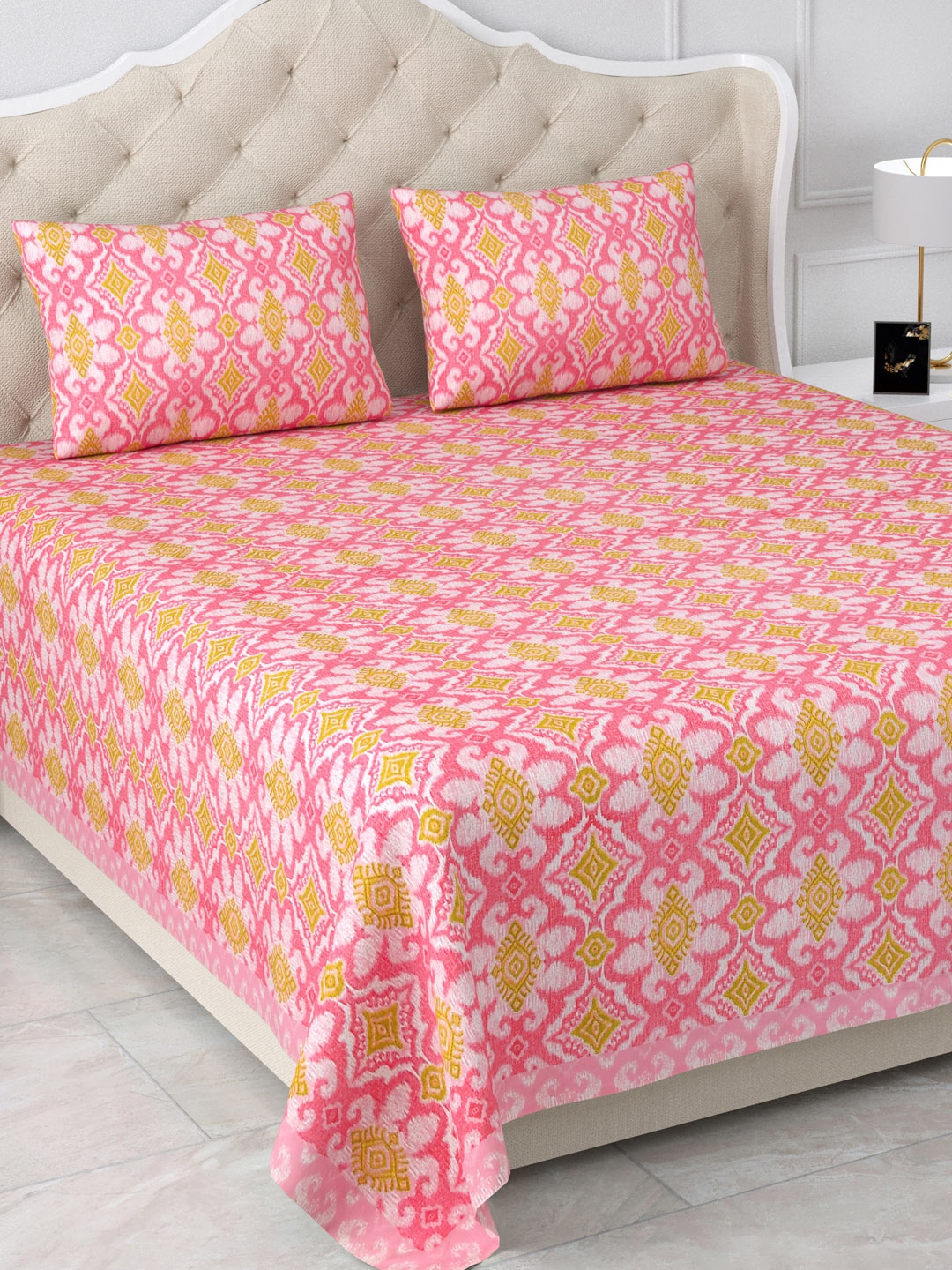 

Aapno Rajasthan Pink & Mustard Printed 120 TC Cotton King Bedsheet & 2 Pillow Covers
