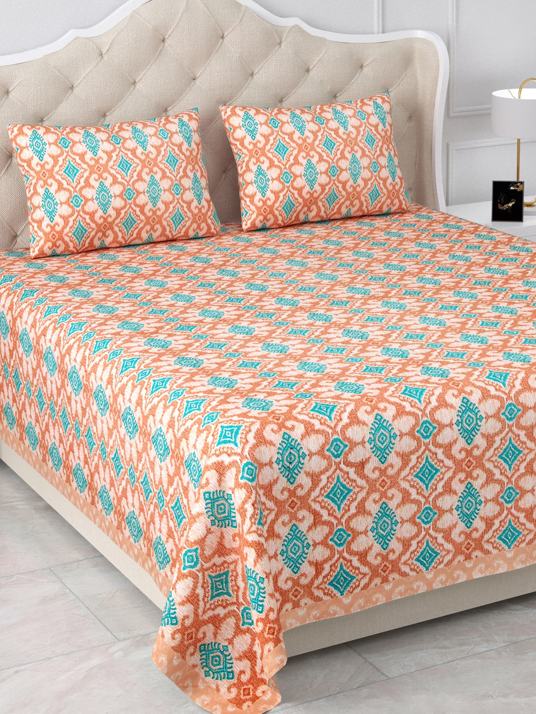 

Aapno Rajasthan Turquoise Blue Printed 120 TC Cotton King Bedsheet & 2 Pillow Covers