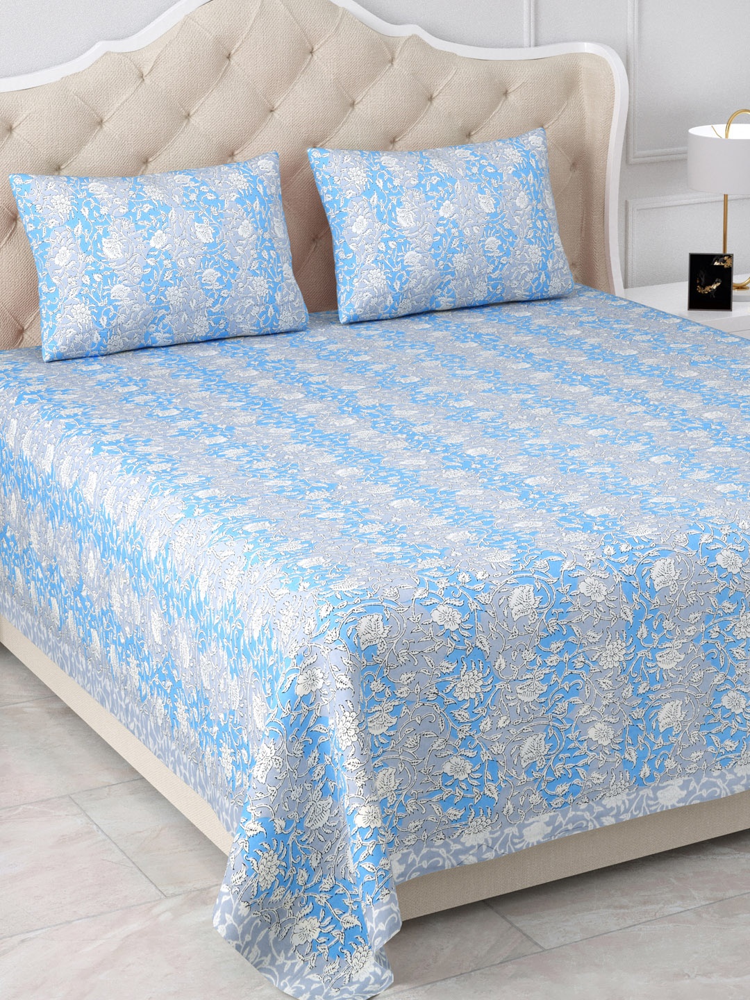 

Aapno Rajasthan Jaipuri Blue & Grey Floral 120 TC Cotton King Bedsheet & 2 Pillow Covers