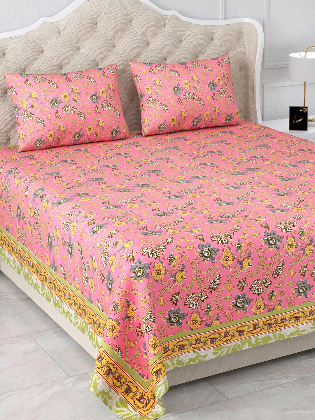 

Aapno Rajasthan Jaipuri Pink & Grey Floral 120 TC Cotton King Bedsheet & 2 Pillow Covers