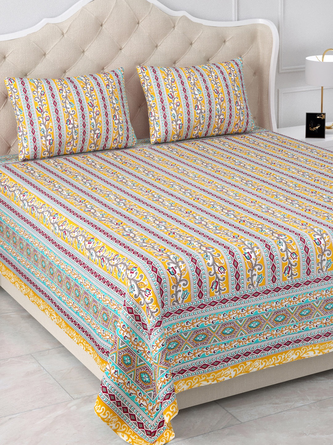 

Aapno Rajasthan Jaipuri Yellow Geometric 120 TC Cotton King Bedsheet & 2 Pillow Covers