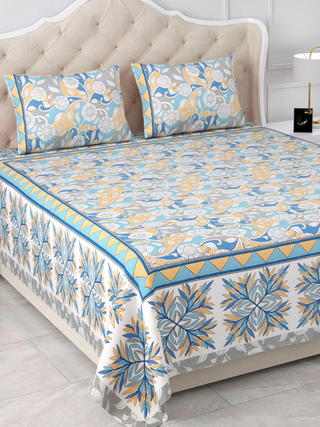 

Aapno Rajasthan Jaipuri White & Blue Floral 120 TC Cotton King Bedsheet & 2 Pillow Covers