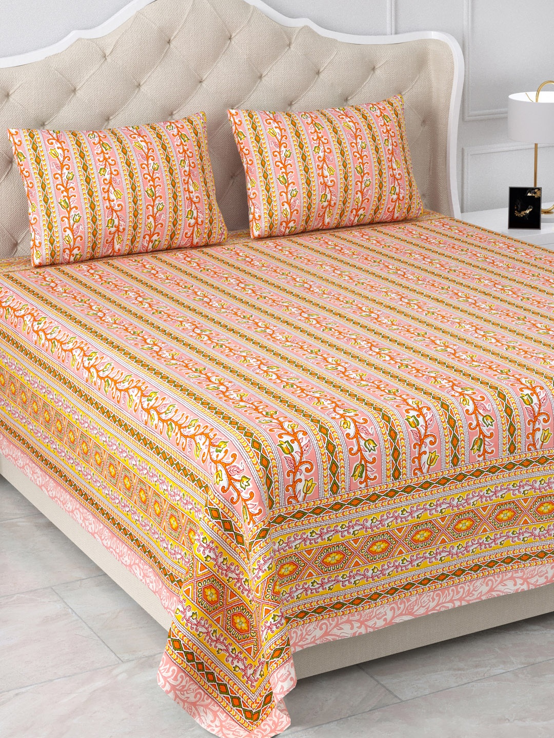 

Aapno Rajasthan Jaipuri Orange Floral 120 TC Cotton King Bedsheet & 2 Pillow Covers