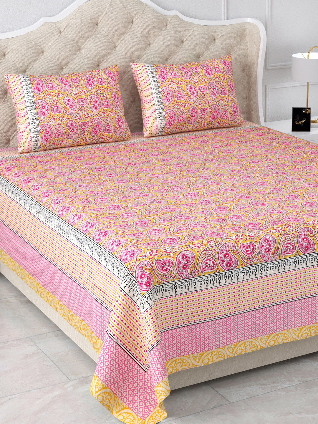 

Aapno Rajasthan Jaipuri Pink & Yellow Floral 120 TC Cotton King Bedsheet & 2 Pillow Covers