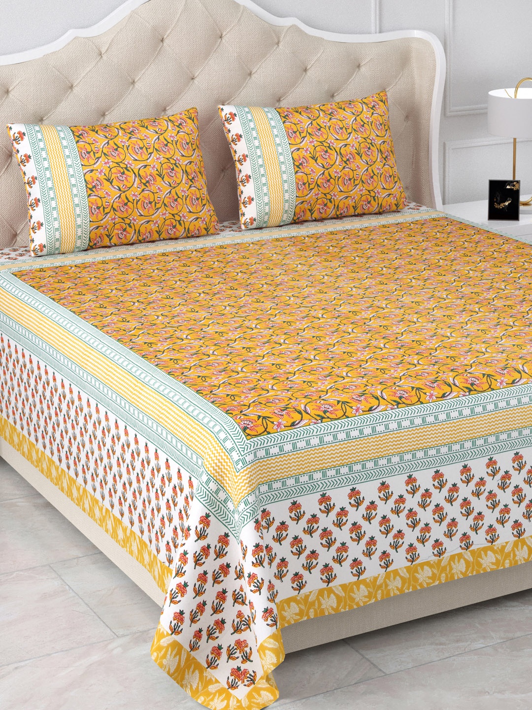 

Aapno Rajasthan Jaipuri Mustard Floral 120 TC Cotton King Bedsheet & 2 Pillow Covers