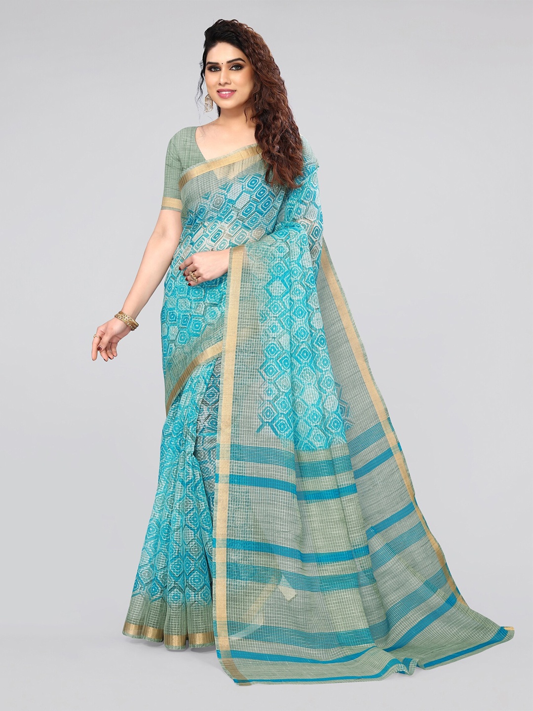 

MIRCHI FASHION Turquoise Blue & Gold-Toned Ethnic Motifs Printed Zari Saree