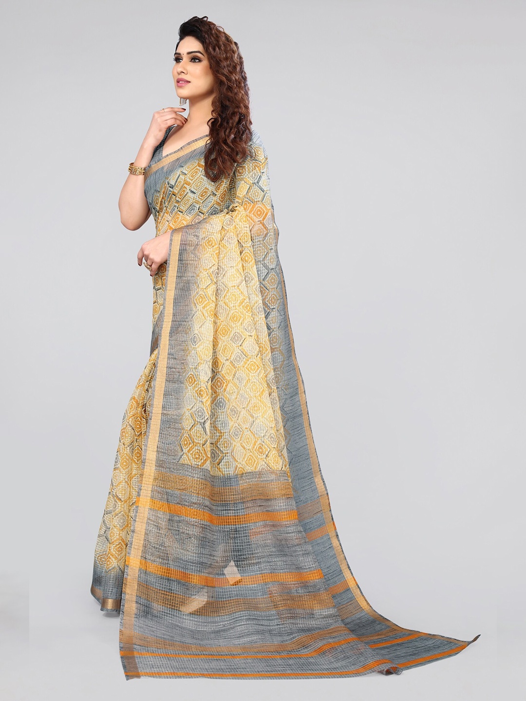 

MIRCHI FASHION Mustard & Grey Ethnic Motifs Printed Zari Saree