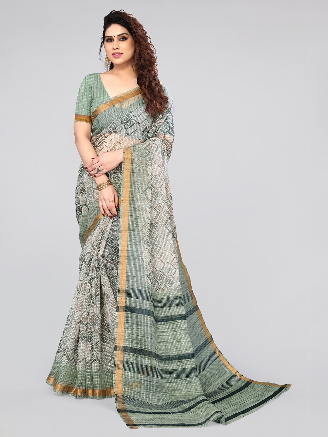 

MIRCHI FASHION Green & Gold-Toned Ethnic Motifs Printed Zari Saree