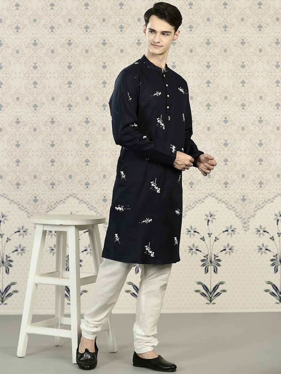 

Ode by House of Pataudi Navy Blue Abstract Printed Regular Kurta with Churidar