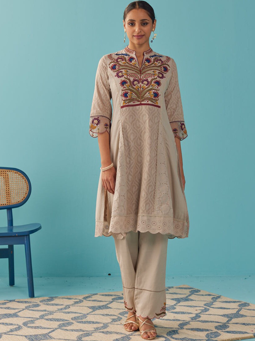 

Lakshita Ethnic Motifs Embroidered Panelled Thread Work Kurta with Trousers, Beige
