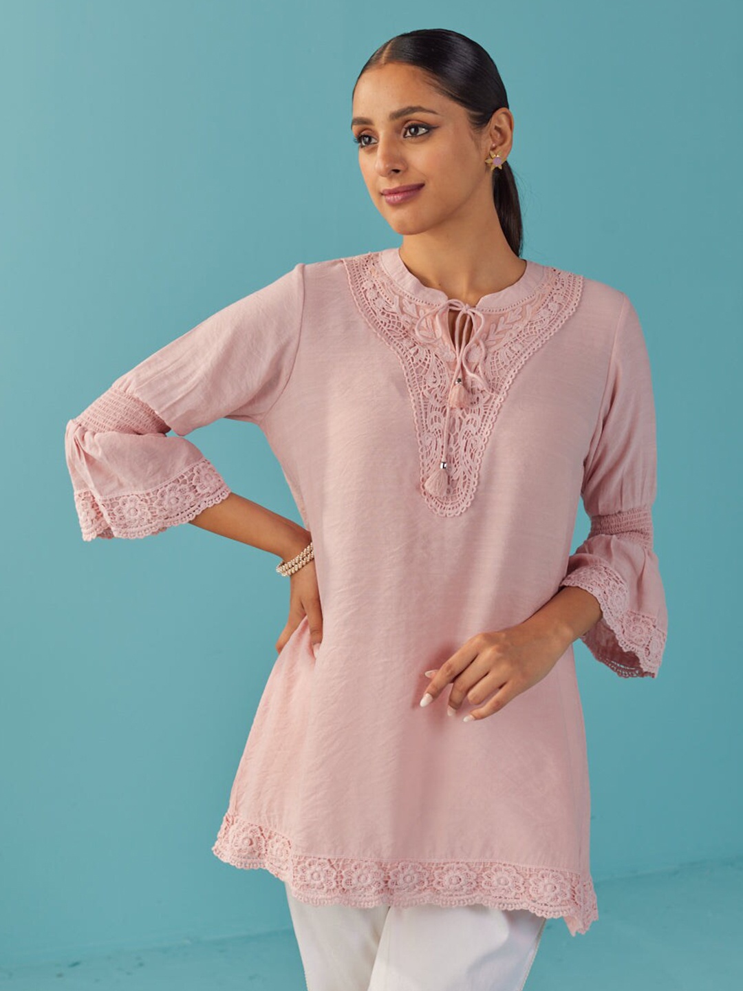 

Lakshita Pink Tie-Up Neck Bell Sleeves Lace Inserts Tunic