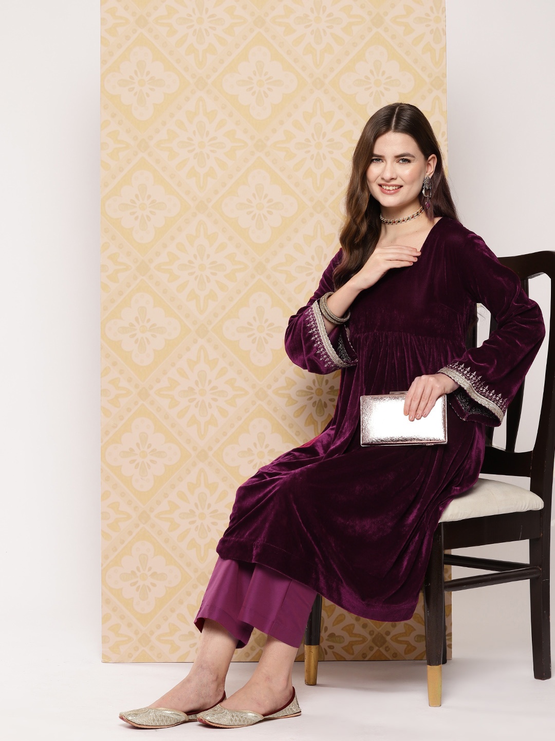 

Sangria Zari Detailed Gotta Patti Flared Sleeves Velvet Kurta and Trousers, Magenta