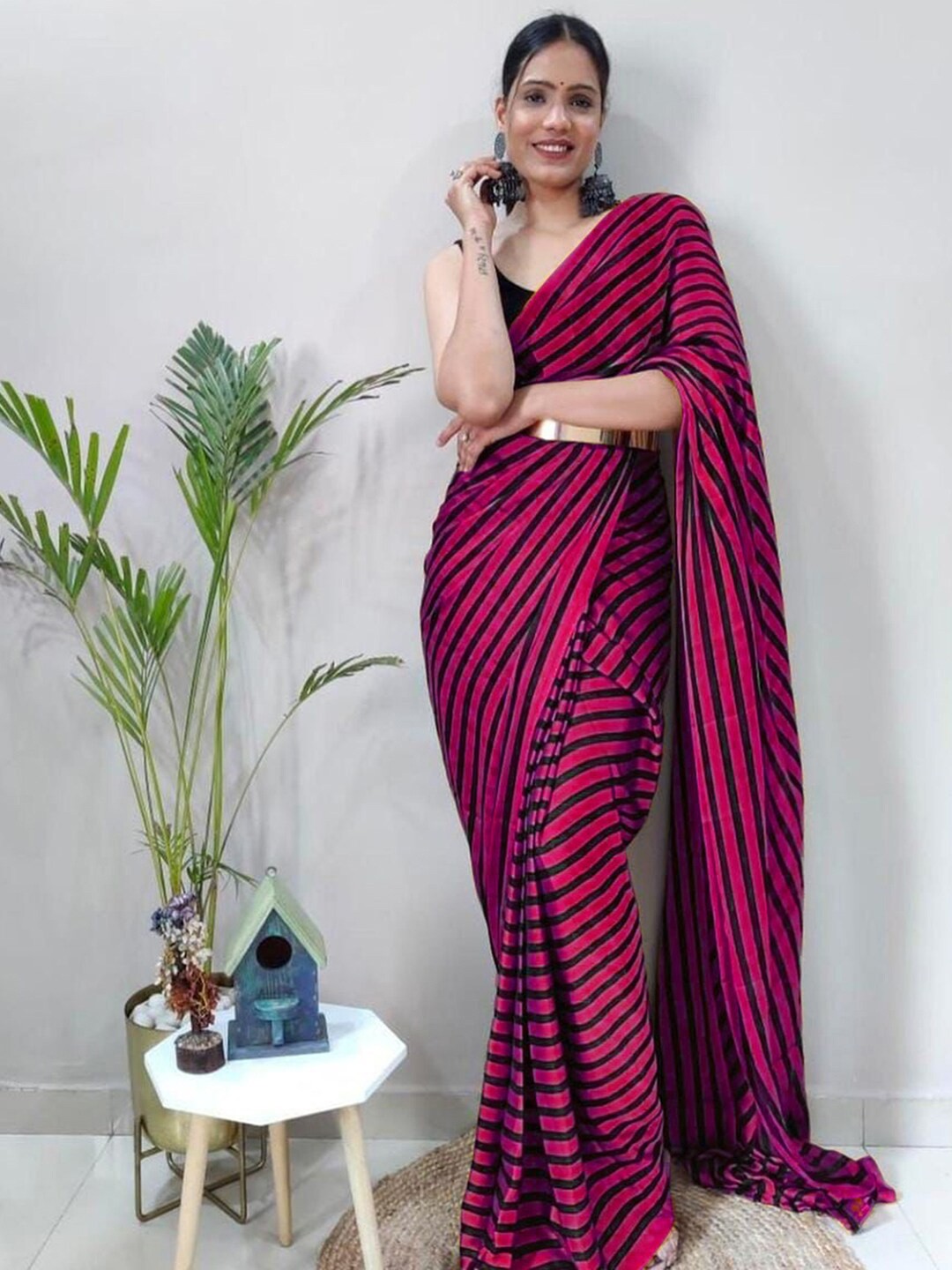 

Mitera Pink & Black Striped Poly Georgette Saree