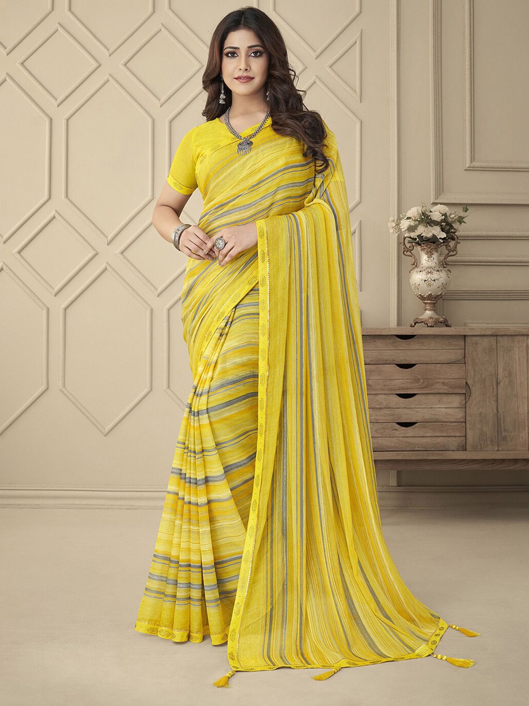 

Mitera Yellow Geometric Printed Poly Chiffon Saree