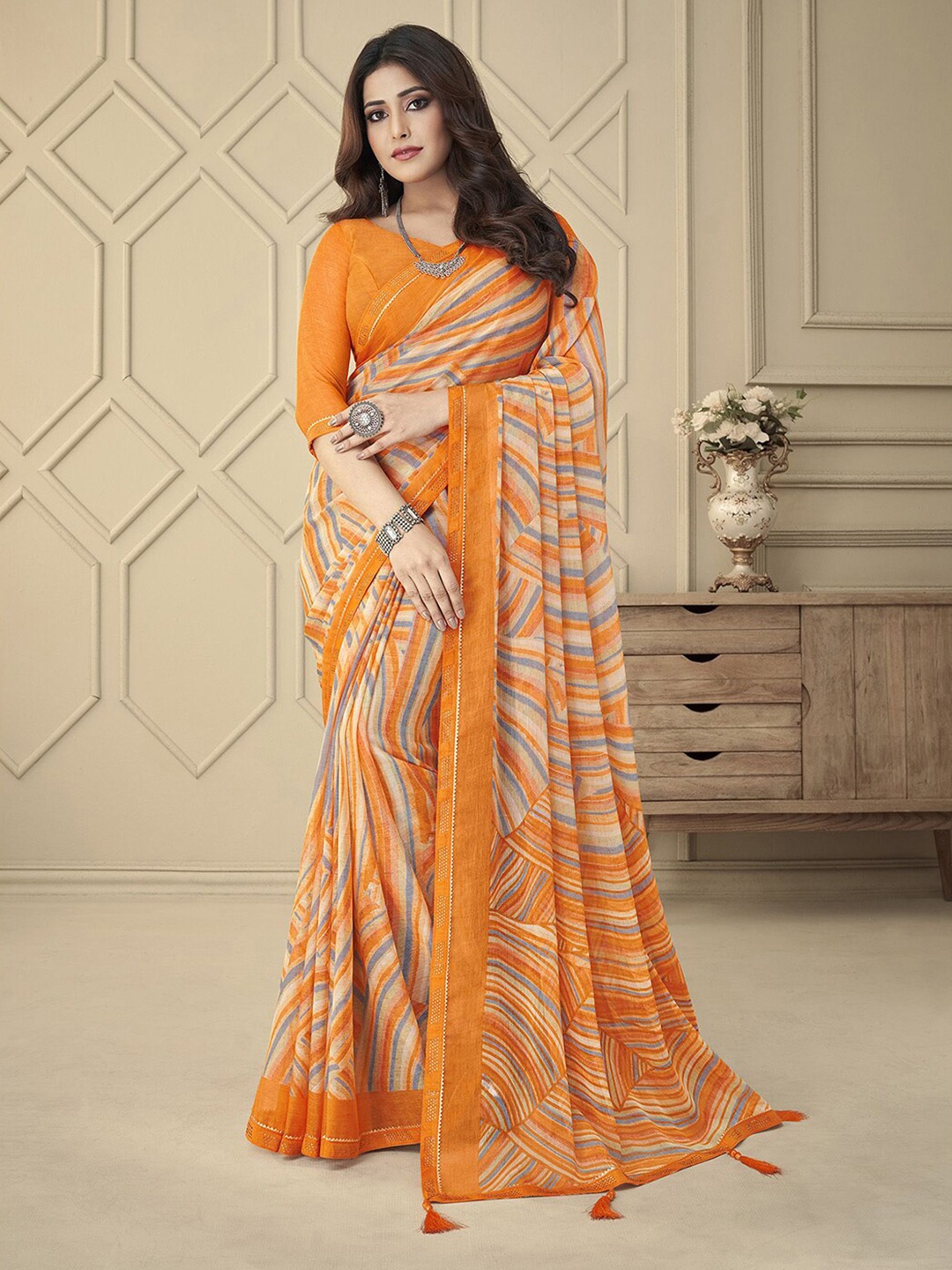 

Mitera Orange Geometric Printed Beads & Stones Saree
