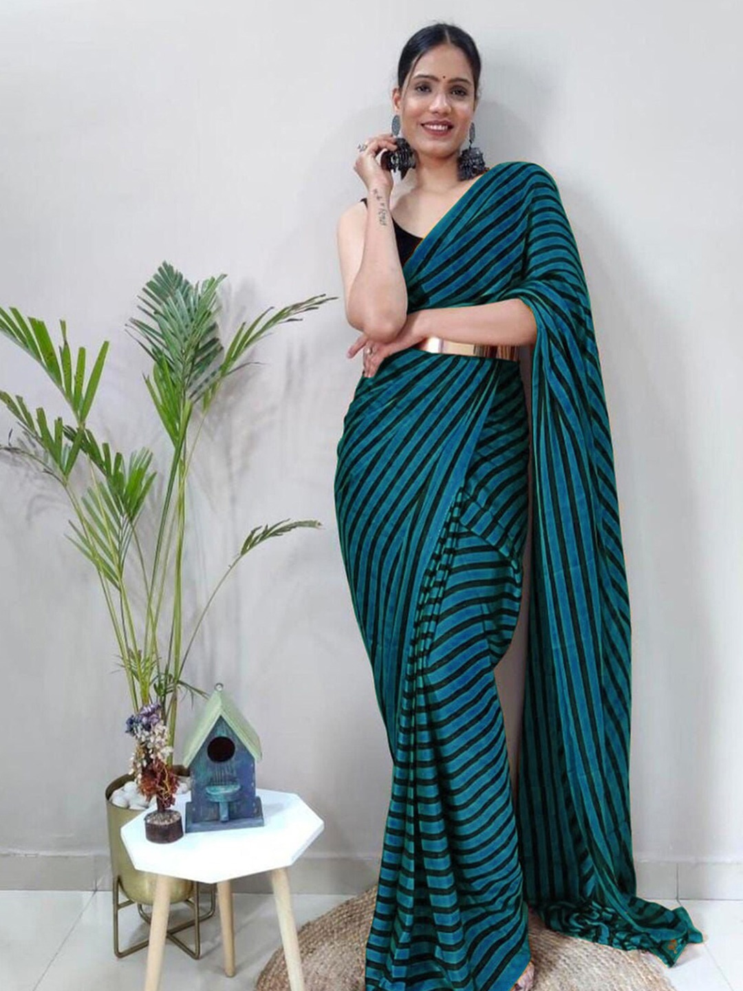 

Mitera Teal Blue & Black Striped Poly Georgette Saree