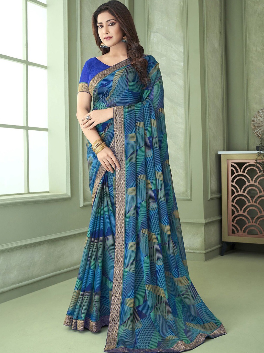 

Mitera Blue & Green Abstract Printed Saree