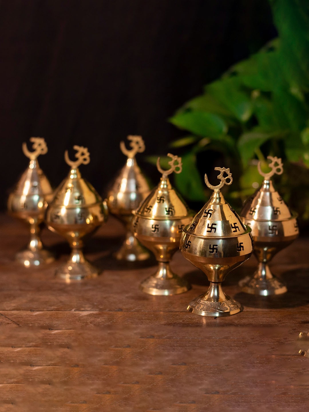 

Fashion Bizz Gold Toned 6-Pieces Swastik Design Brass Diyas