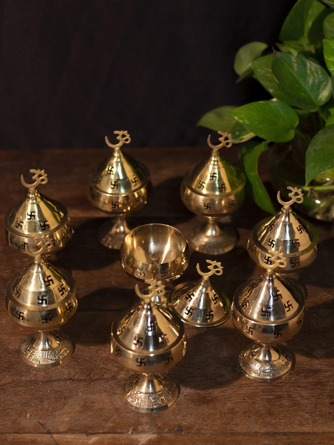 

Fashion Bizz Gold Toned 8 Pieces Om Design Brass Diyas