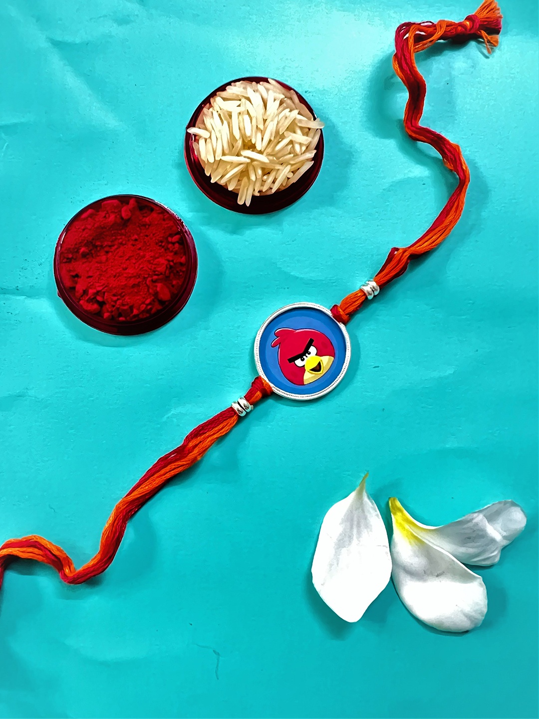 

Arte Jewels Angry Bird Charm Thread Rakhi, Silver