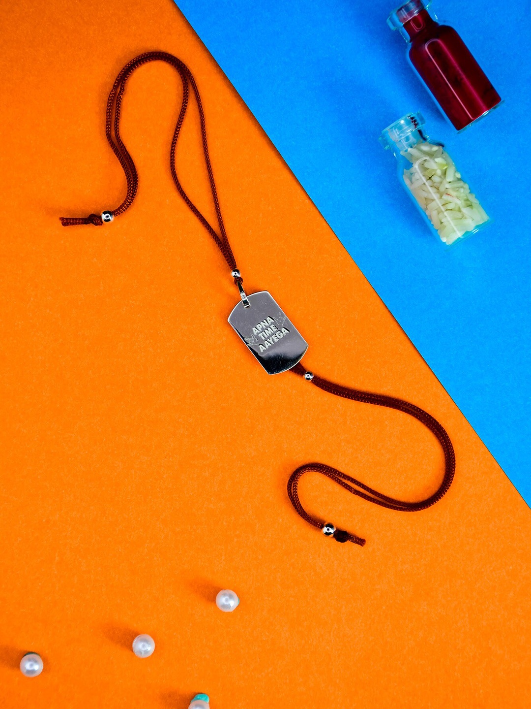 

Arte Jewels Square Shaped Thread Rakhi, Silver