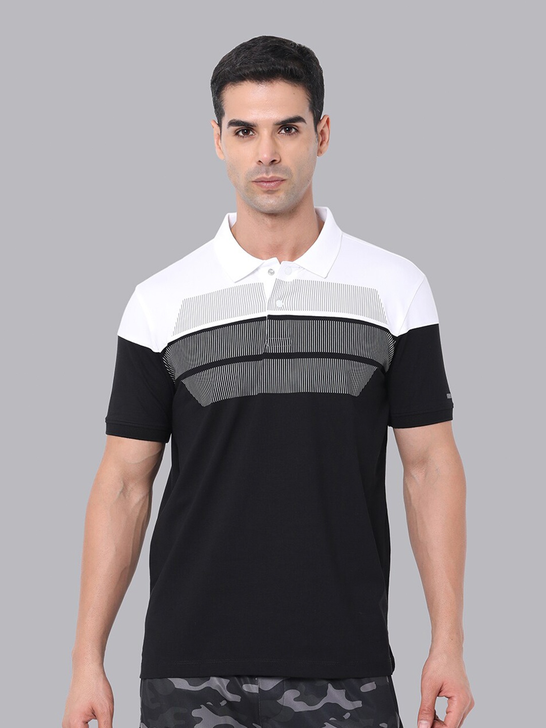 

Van Heusen Flex Men Striped Polo Collar T-shirt, Black