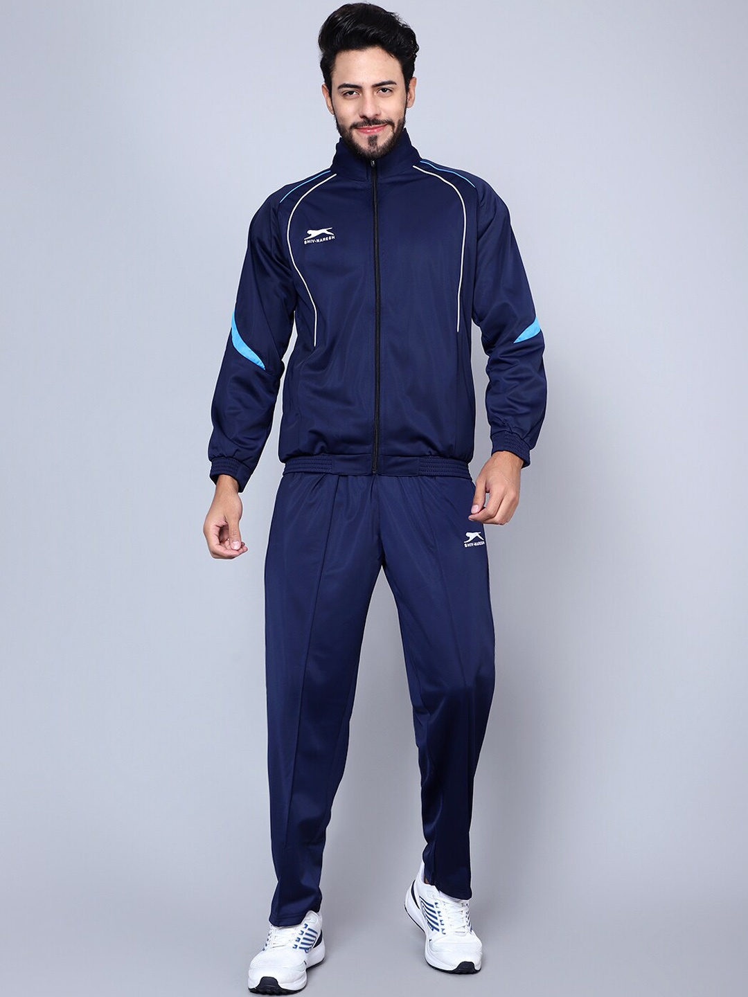 

Shiv Naresh Men Brand Logo Printed Tracksuits, Blue