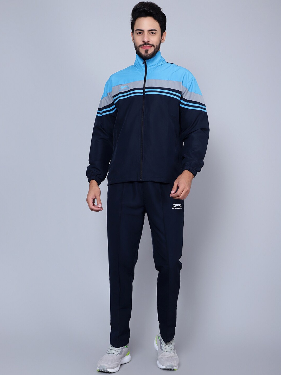 

Shiv Naresh Men Colourblocked Sports Tracksuits, Blue