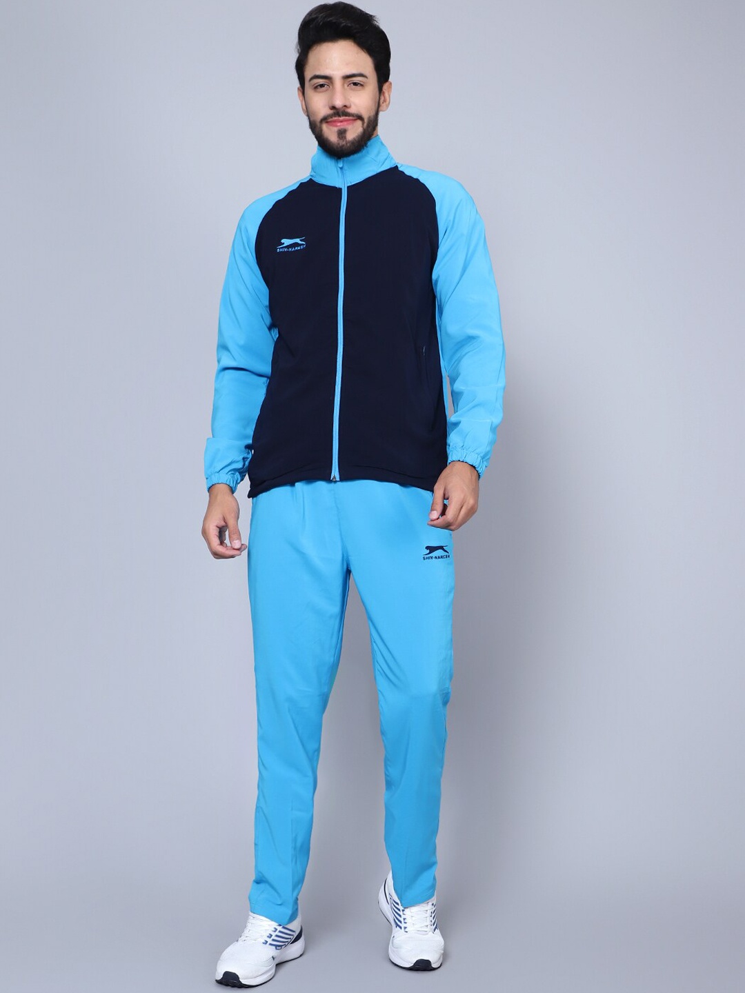 

Shiv Naresh Men Colorblocked Sports Tracksuits, Blue