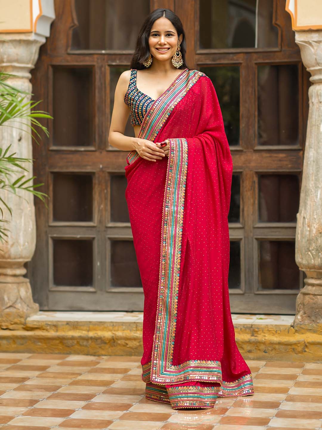 

Libas Solid Embroidered Silk Blend Saree, Maroon