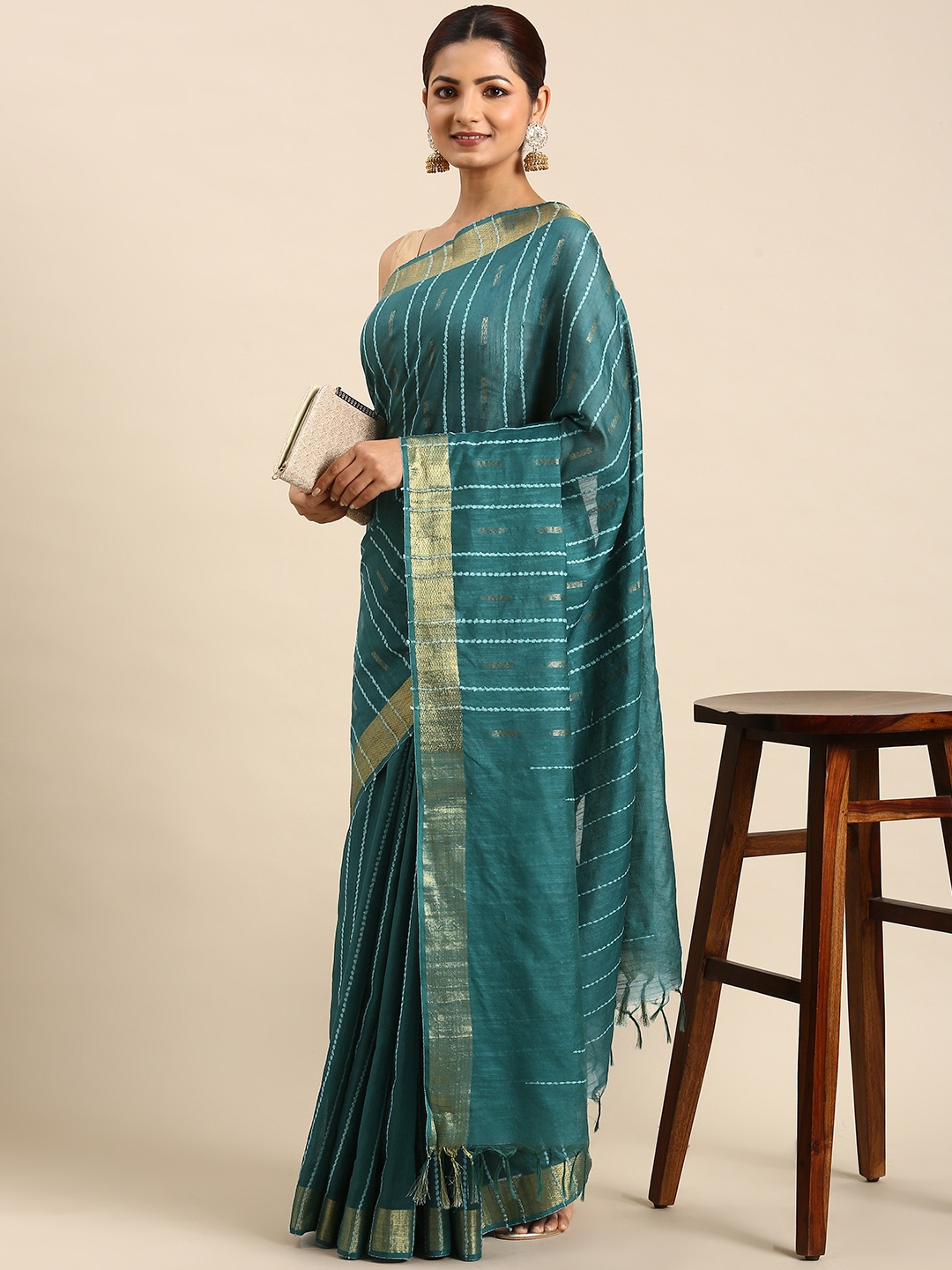 

swatika Woven Design Zari Silk Blend Bhagalpuri Saree, Green