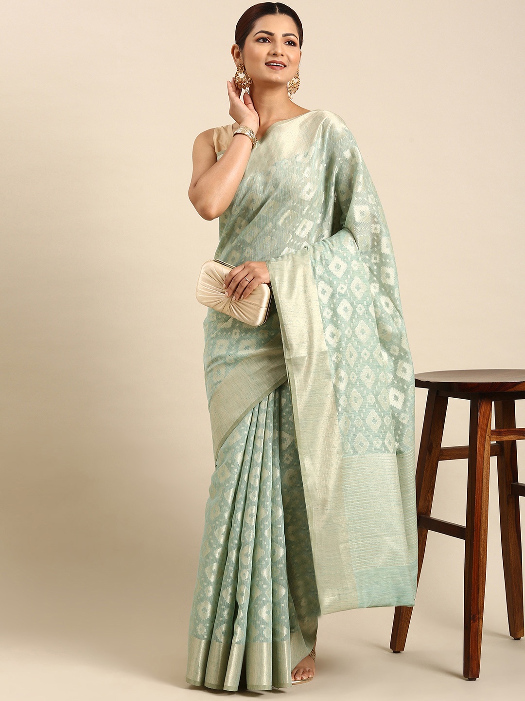 

swatika Woven Design Zari Silk Blend Banarasi Saree, Green