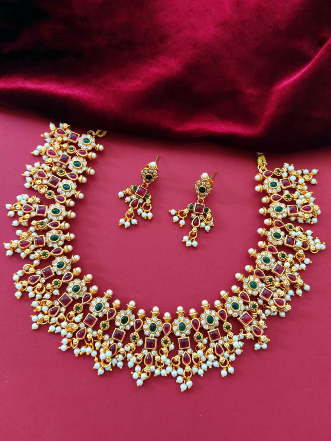 

Pihtara Jewels Gold-Plated Stone-Studded & Pearl Beaded Jewellery Set