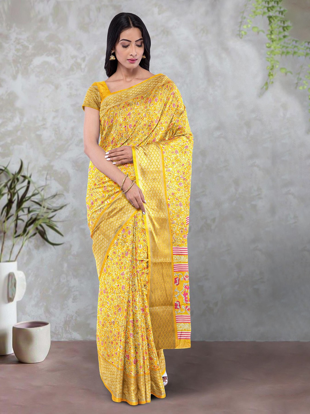 

Kalamandir Floral Printed Zari Saree, Yellow