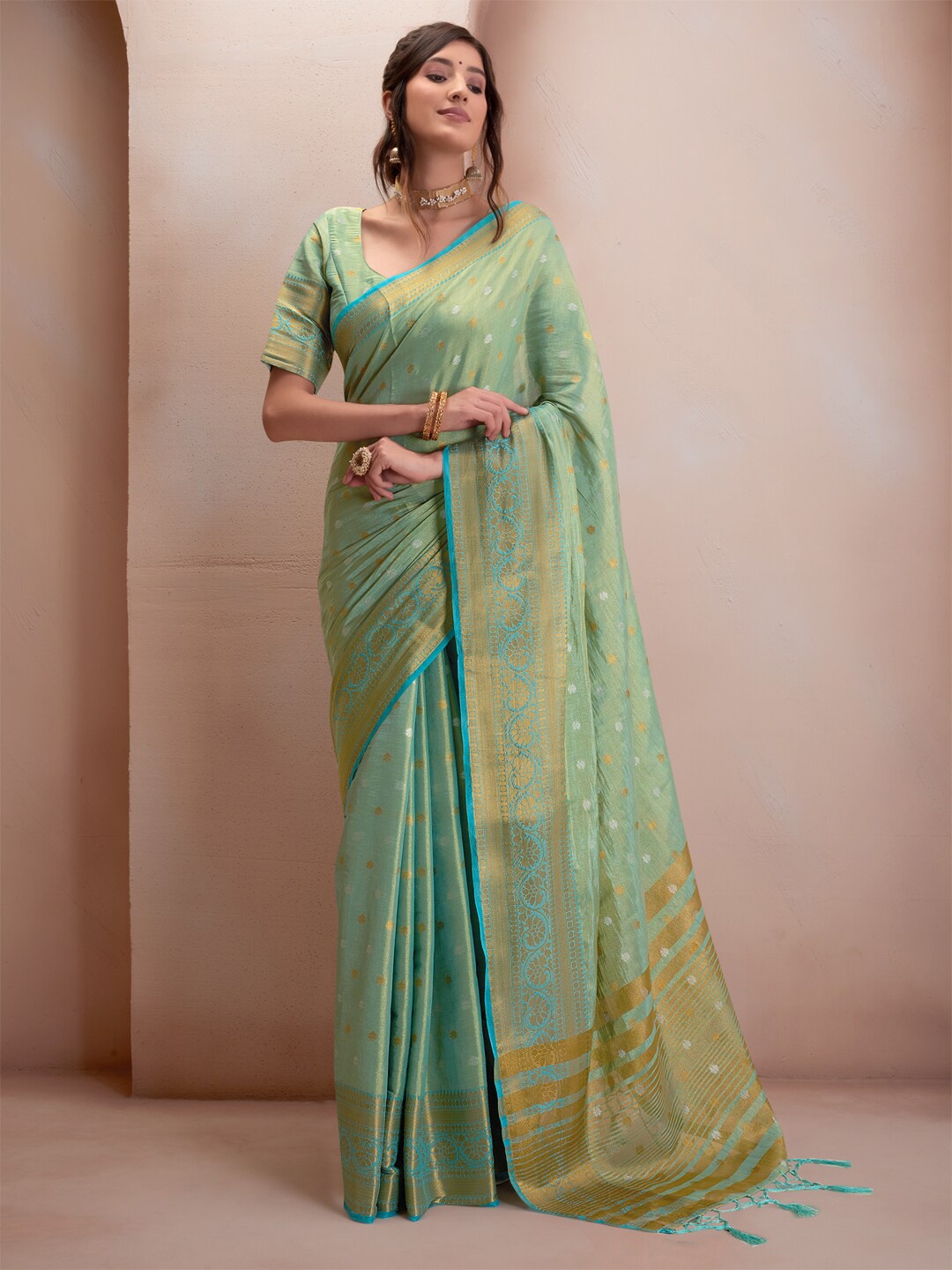 

Inddus Green Woven Design Zari Silk Blend Saree