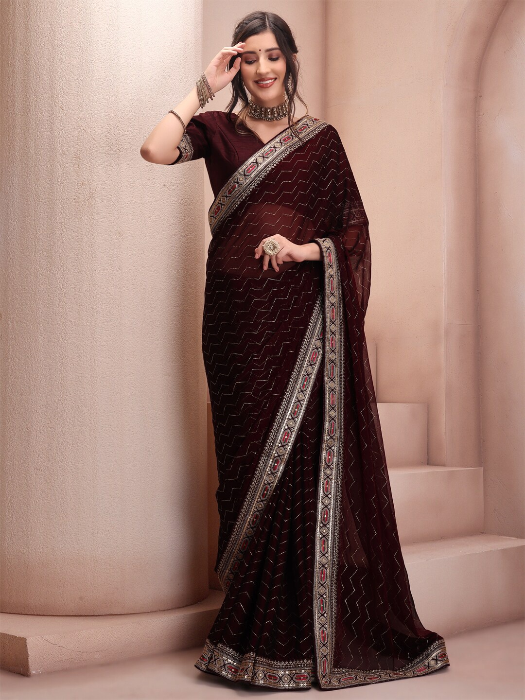 

Inddus Maroon Striped Embroidered Sequinned Poly Chiffon Saree